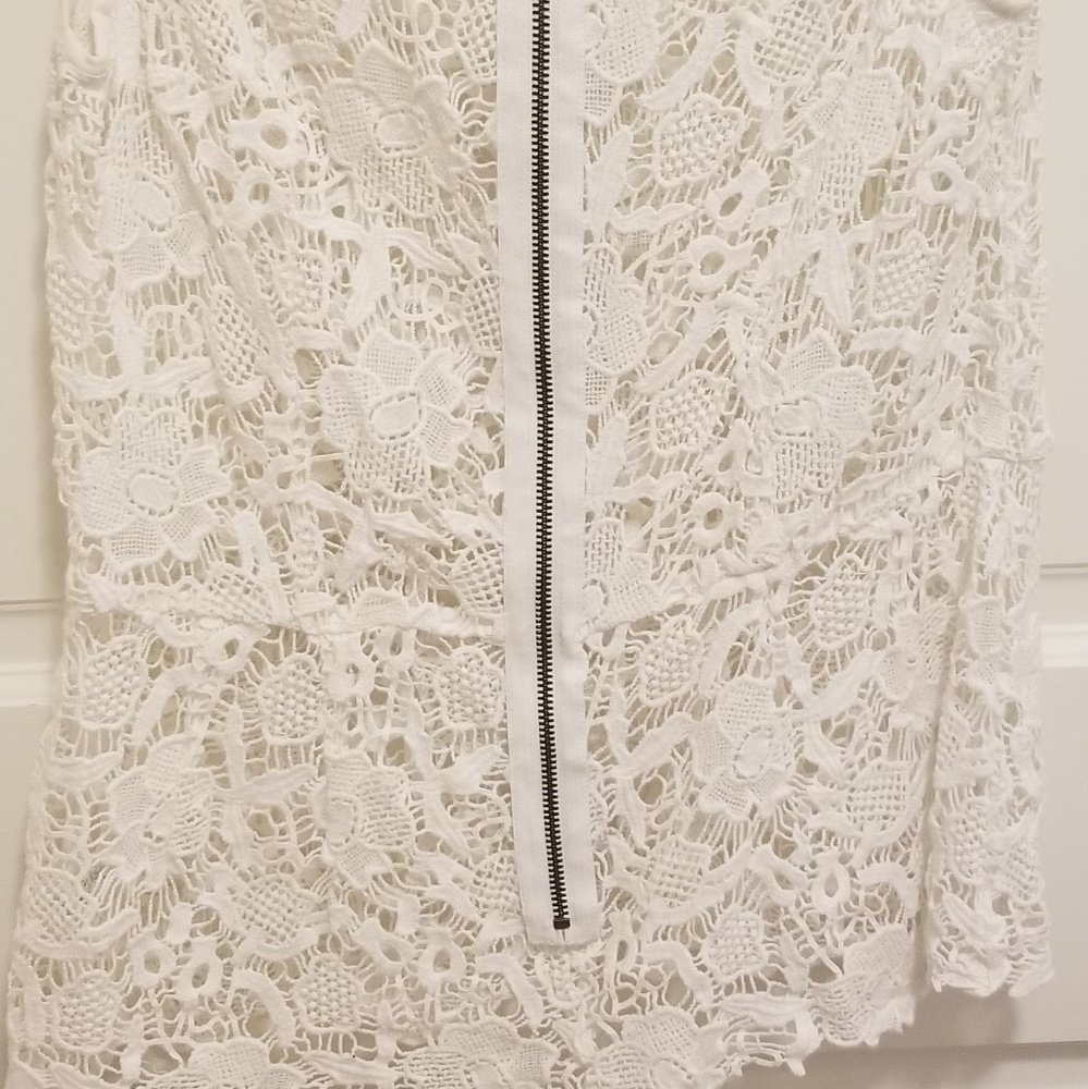 Knit top with floral detail